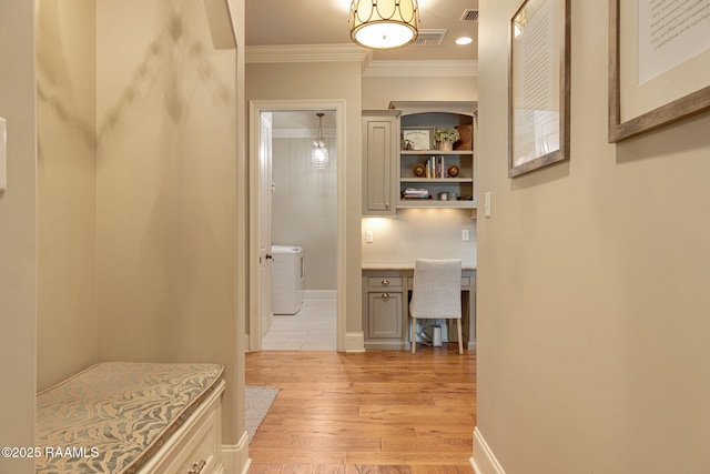 301 Gleneagles Cir, Broussard, LA 70518 - hallway featuring ornamental molding, light wood-style floors, and a desk