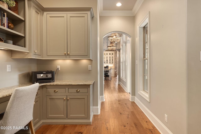301 Gleneagles Cir, Broussard, LA 70518 - hall featuring crown molding, arched walkways, light wood-type flooring, a chandelier, and recessed lighting