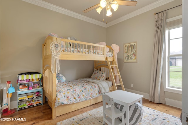 301 Gleneagles Cir, Broussard, LA 70518 - bedroom with multiple windows, crown molding, wood finished floors, and a ceiling fan