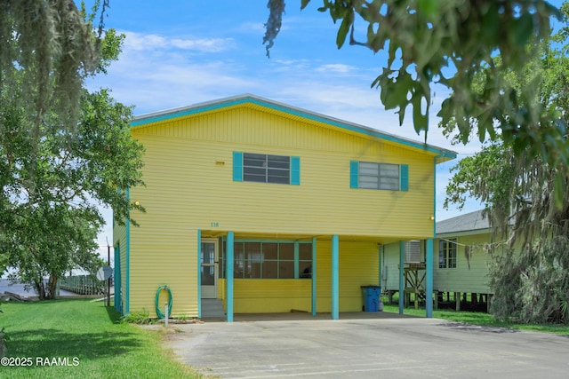 116 Sunset Blvd, Cypremort Point, LA 70538 - view of front of home featuring a carport, driveway, and a front lawn