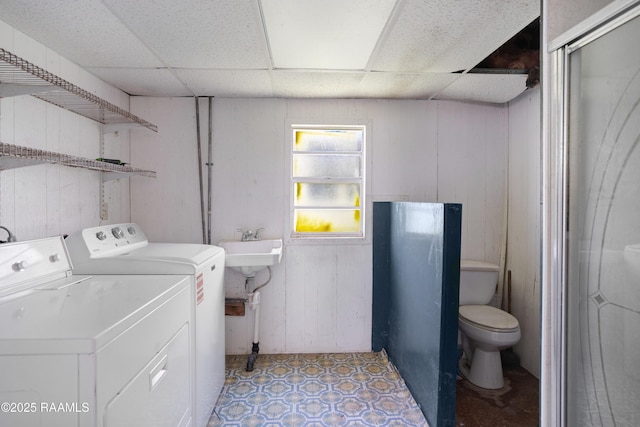 116 Sunset Blvd, Cypremort Point, LA 70538 - washroom with washer and clothes dryer and wooden walls