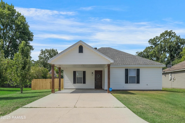 1404 Howard St, New Iberia, LA 70563 - view of front of home with driveway and roof with shingles
