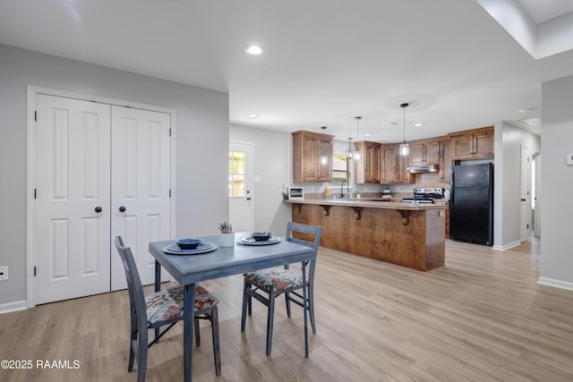 1404 Howard St, New Iberia, LA 70563 - dining area with recessed lighting and light wood-style floors