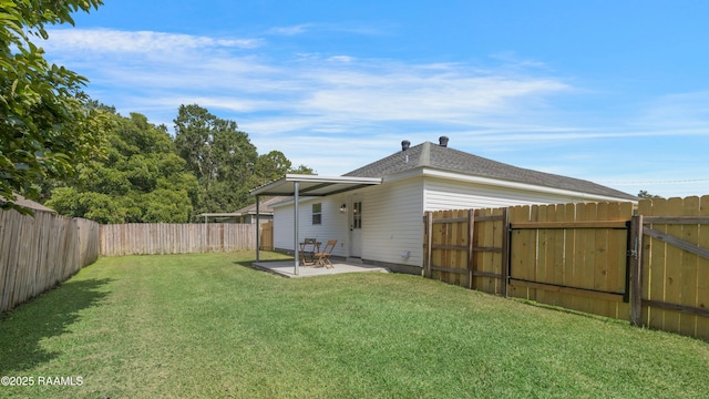 1404 Howard St, New Iberia, LA 70563 - rear view of property with a patio and a fenced backyard