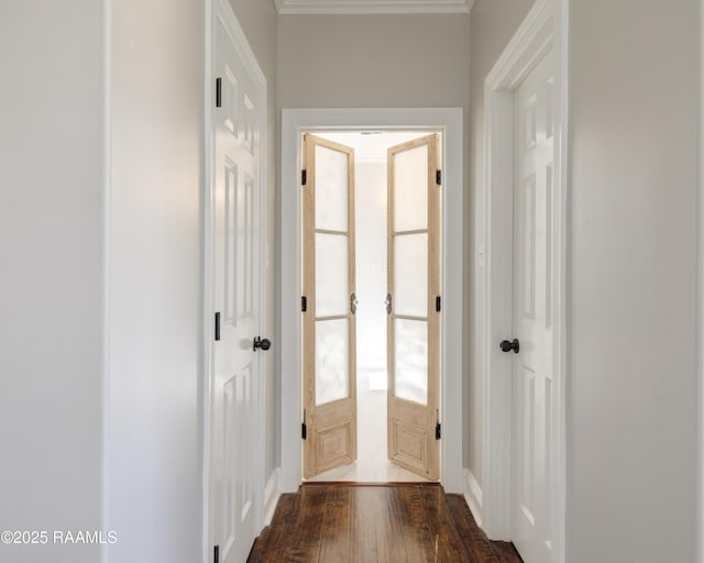 12511 Aube Dr, Abbeville, LA 70510 - corridor featuring dark wood finished floors and ornamental molding