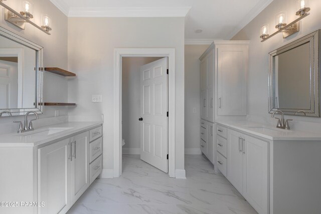 12511 Aube Dr, Abbeville, LA 70510 - full bath featuring marble finish floors, two vanities, and crown molding