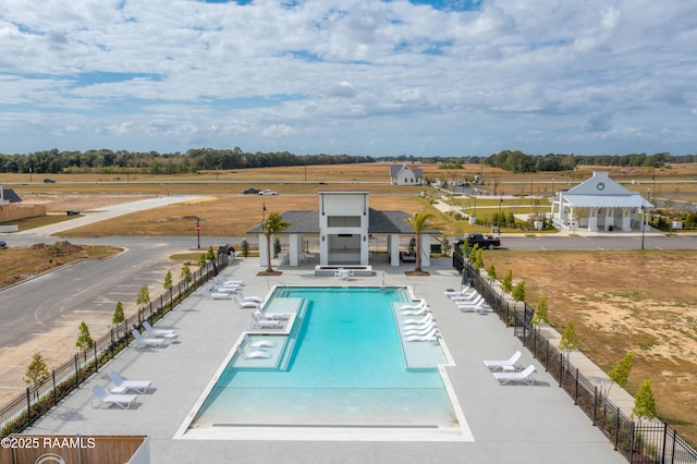 216 Keystone Dr, Scott, LA 70583 - community pool featuring a patio area, a gazebo, and view of wooded area