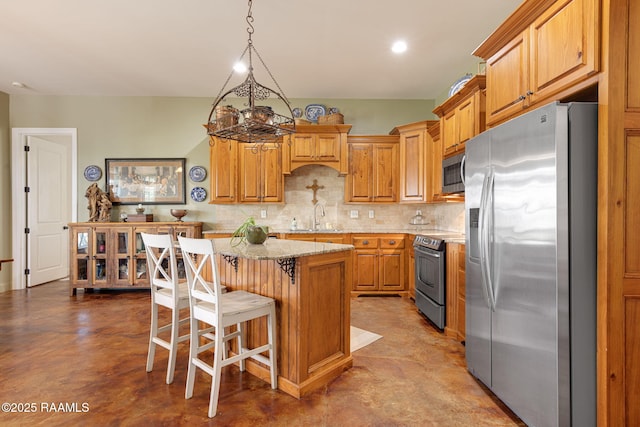 7804 Picard Rd, Maurice, LA 70555 - kitchen featuring stainless steel appliances, finished concrete flooring, backsplash, a center island, and recessed lighting