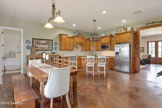 7804 Picard Rd, Maurice, LA 70555 - dining space with recessed lighting and concrete floors