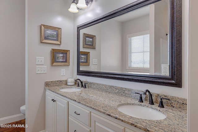 7804 Picard Rd, Maurice, LA 70555 - bathroom with double vanity and toilet
