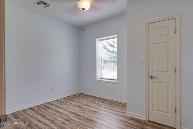 7804 Picard Rd, Maurice, LA 70555 - spare room featuring wood finished floors and ceiling fan