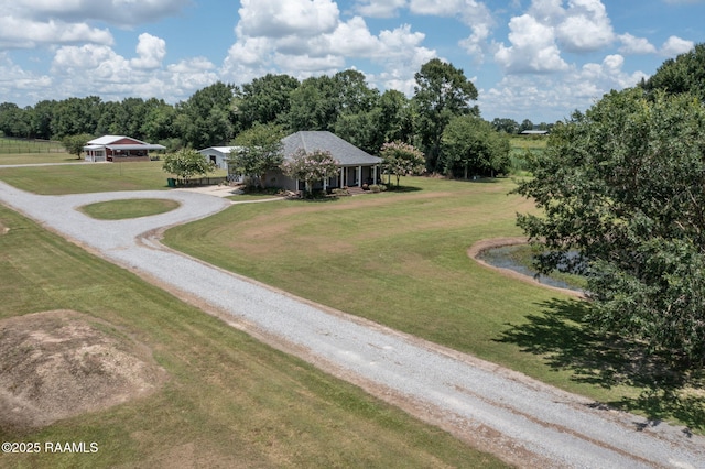7804 Picard Rd, Maurice, LA 70555 - view of property's community featuring gravel driveway and a lawn