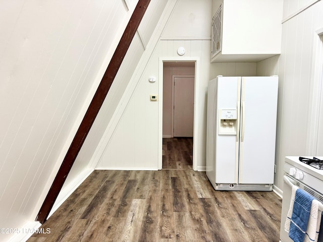 607 Ernest St, New Iberia, LA 70563 - kitchen with white appliances, wood finished floors, and white cabinets
