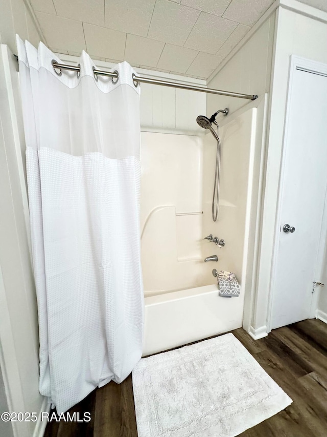 607 Ernest St, New Iberia, LA 70563 - full bath with shower / bath combo and wood finished floors