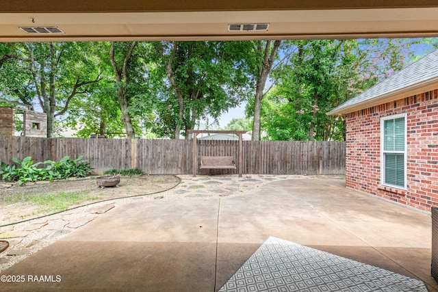 117 Montero Cir, Lafayette, LA 70503 - fenced backyard featuring a patio