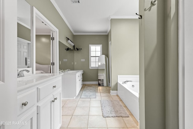 117 Montero Cir, Lafayette, LA 70503 - bathroom with vanity, a garden tub, ornamental molding, tile patterned floors, and ensuite bathroom
