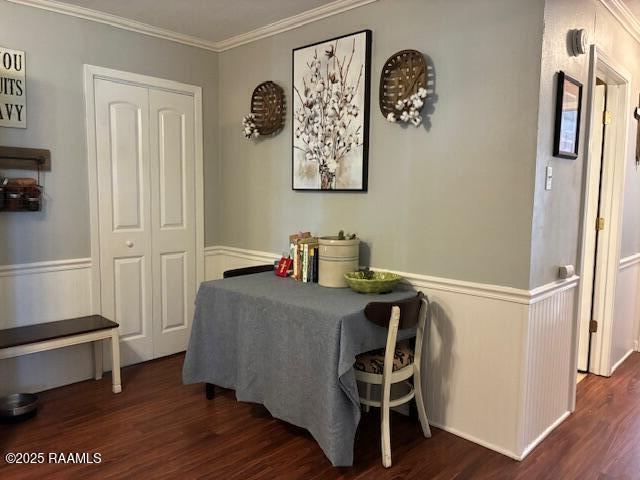 105 Sugar Dr, Broussard, LA 70518 - dining area with wood finished floors, crown molding, and wainscoting