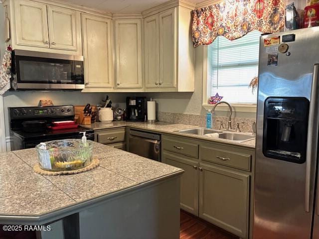 105 Sugar Dr, Broussard, LA 70518 - kitchen with stainless steel appliances, tile counters, and dark wood-type flooring