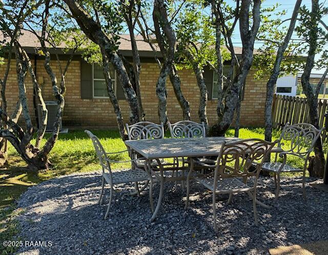 105 Sugar Dr, Broussard, LA 70518 - view of patio featuring outdoor dining space