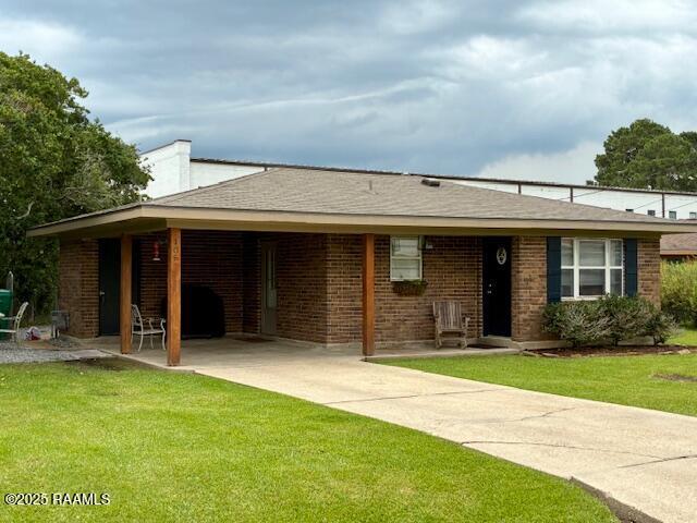 105 Sugar Dr, Broussard, LA 70518 - view of front of property with a front lawn and brick siding