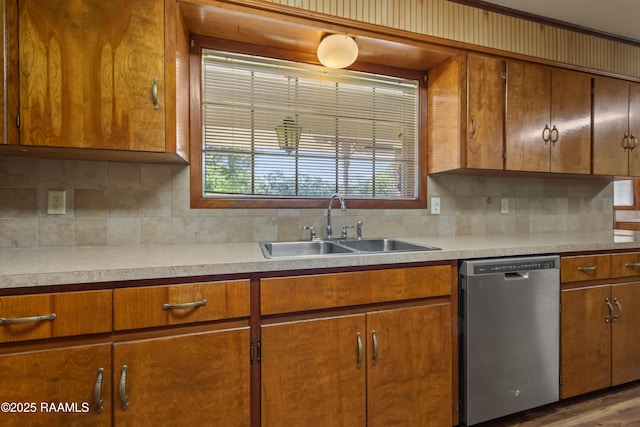 1212 S Main St, Breaux Bridge, LA 70517 - kitchen with dishwasher, brown cabinetry, and tasteful backsplash
