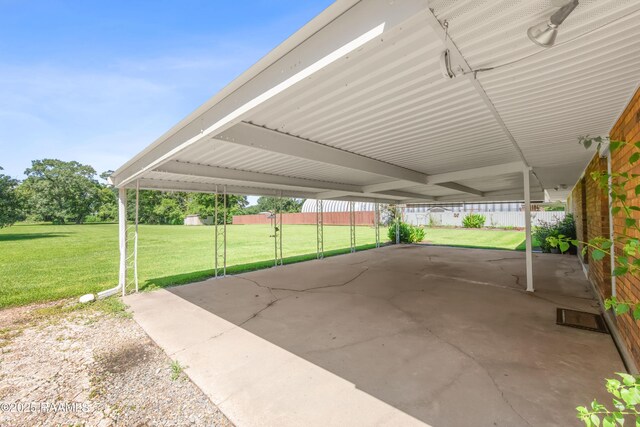 1212 S Main St, Breaux Bridge, LA 70517 - view of patio / terrace featuring a carport