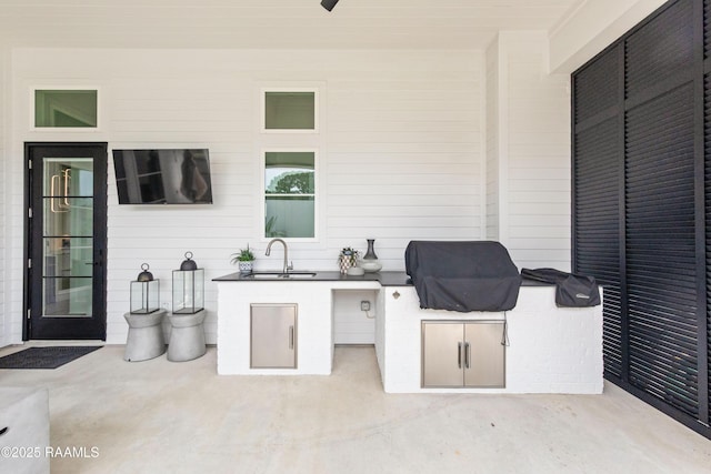 100 Catamaran Dr, Youngsville, LA 70592 - view of patio / terrace featuring area for grilling and a sink
