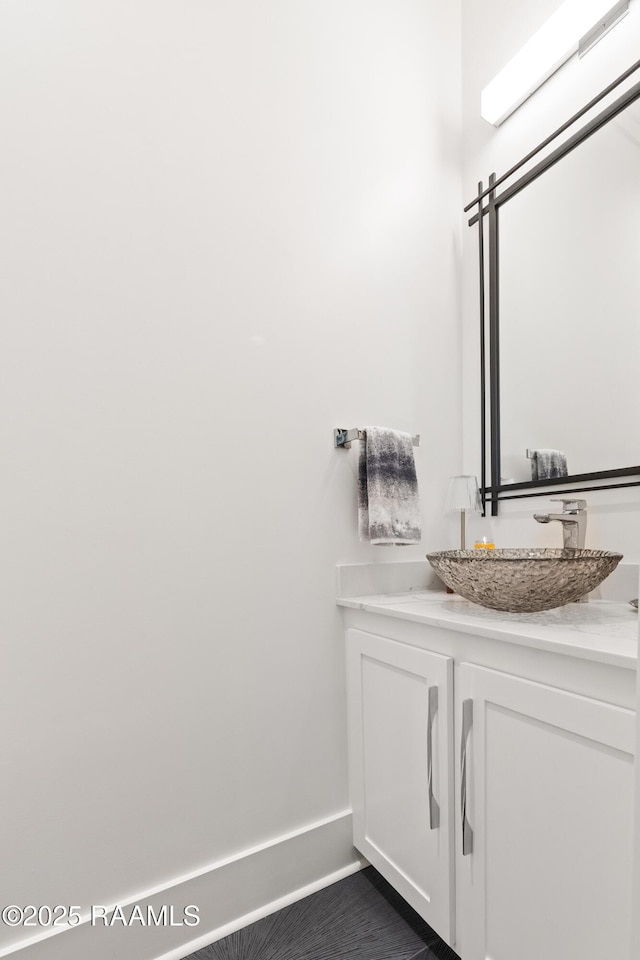 100 Catamaran Dr, Youngsville, LA 70592 - bathroom with vanity and baseboards
