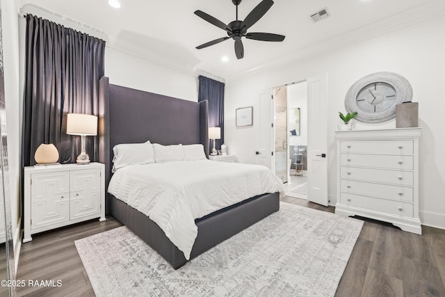 100 Catamaran Dr, Youngsville, LA 70592 - bedroom featuring ornamental molding, dark wood finished floors, recessed lighting, a ceiling fan, and connected bathroom