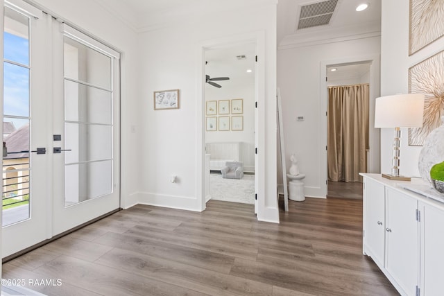 100 Catamaran Dr, Youngsville, LA 70592 - doorway to outside featuring crown molding, healthy amount of natural light, french doors, wood finished floors, and ceiling fan