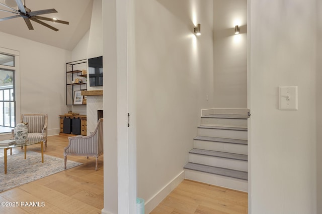 106 Sonoma Way, Lafayette, LA 70508 - stairway with a ceiling fan, wood finished floors, a premium fireplace, and high vaulted ceiling