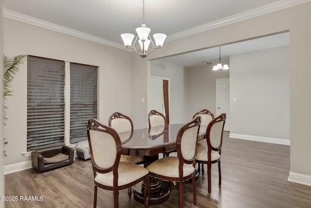 213 E Peck Blvd, Lafayette, LA 70508 - dining area with a chandelier, wood finished floors, and crown molding