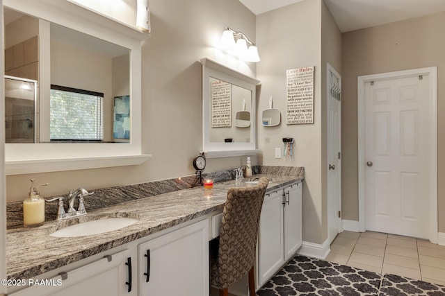 213 E Peck Blvd, Lafayette, LA 70508 - full bath featuring double vanity, tile patterned flooring, and a tile shower