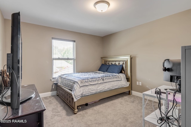213 E Peck Blvd, Lafayette, LA 70508 - bedroom with baseboards and light carpet
