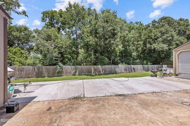 213 E Peck Blvd, Lafayette, LA 70508 - fenced backyard featuring a patio area