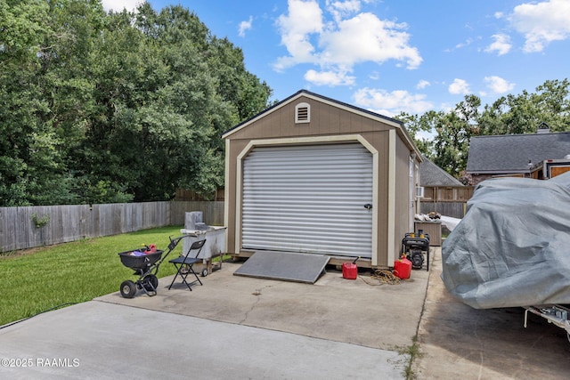 213 E Peck Blvd, Lafayette, LA 70508 - garage featuring a shed
