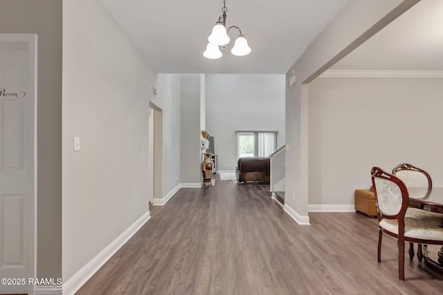 213 E Peck Blvd, Lafayette, LA 70508 - entrance foyer featuring a chandelier and wood finished floors