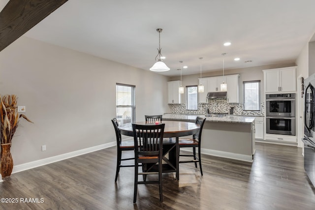 213 E Peck Blvd, Lafayette, LA 70508 - dining room featuring recessed lighting and dark wood finished floors