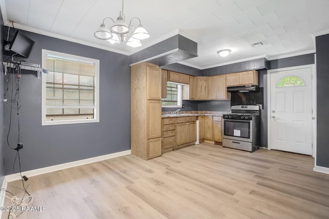 809 Cecile Blvd, Breaux Bridge, LA 70517 - kitchen with gas stove, crown molding, a chandelier, light wood-style floors, and healthy amount of natural light