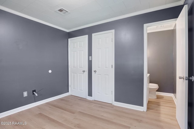 809 Cecile Blvd, Breaux Bridge, LA 70517 - unfurnished bedroom featuring wood finished floors and crown molding