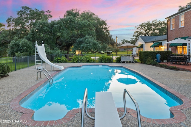 6302 Old Jeanerette Rd, New Iberia, LA 70563 - view of pool featuring a water slide and a patio area