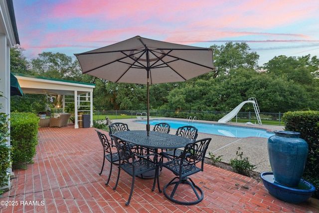6302 Old Jeanerette Rd, New Iberia, LA 70563 - fenced backyard with a patio and outdoor dining space