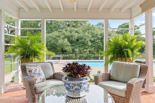 6302 Old Jeanerette Rd, New Iberia, LA 70563 - sunroom with beam ceiling, plenty of natural light, and an outdoor hangout area