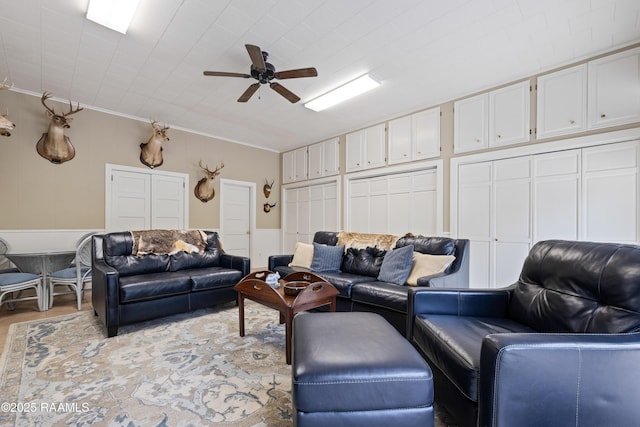 6302 Old Jeanerette Rd, New Iberia, LA 70563 - living room with a ceiling fan, ornamental molding, and light wood finished floors