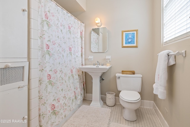 6302 Old Jeanerette Rd, New Iberia, LA 70563 - full bathroom featuring tile patterned floors, curtained shower, and a heating unit