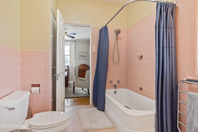 6302 Old Jeanerette Rd, New Iberia, LA 70563 - full bathroom with tile walls, shower / bath combo, and wood finished floors