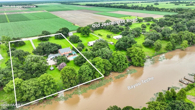 6302 Old Jeanerette Rd, New Iberia, LA 70563 - aerial view of sparsely populated area featuring large plots for crops, property boundaries highlighted, and a nearby body of water