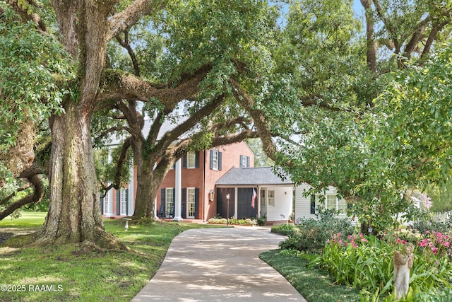 6302 Old Jeanerette Rd, New Iberia, LA 70563 - view of front of house featuring concrete driveway and roof with shingles