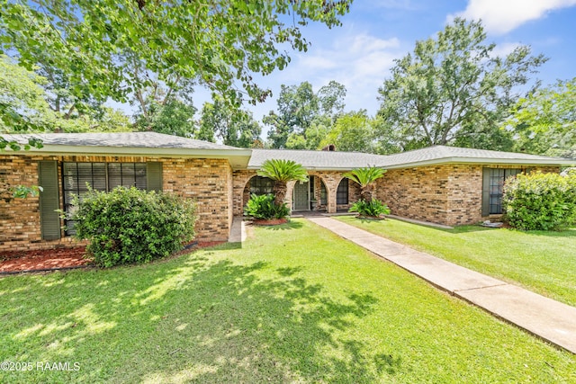 118 Garrigue Dr, Opelousas, LA 70570 - single story home featuring brick siding and a front lawn