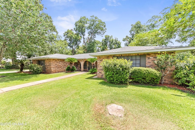 118 Garrigue Dr, Opelousas, LA 70570 - single story home with brick siding and a front yard